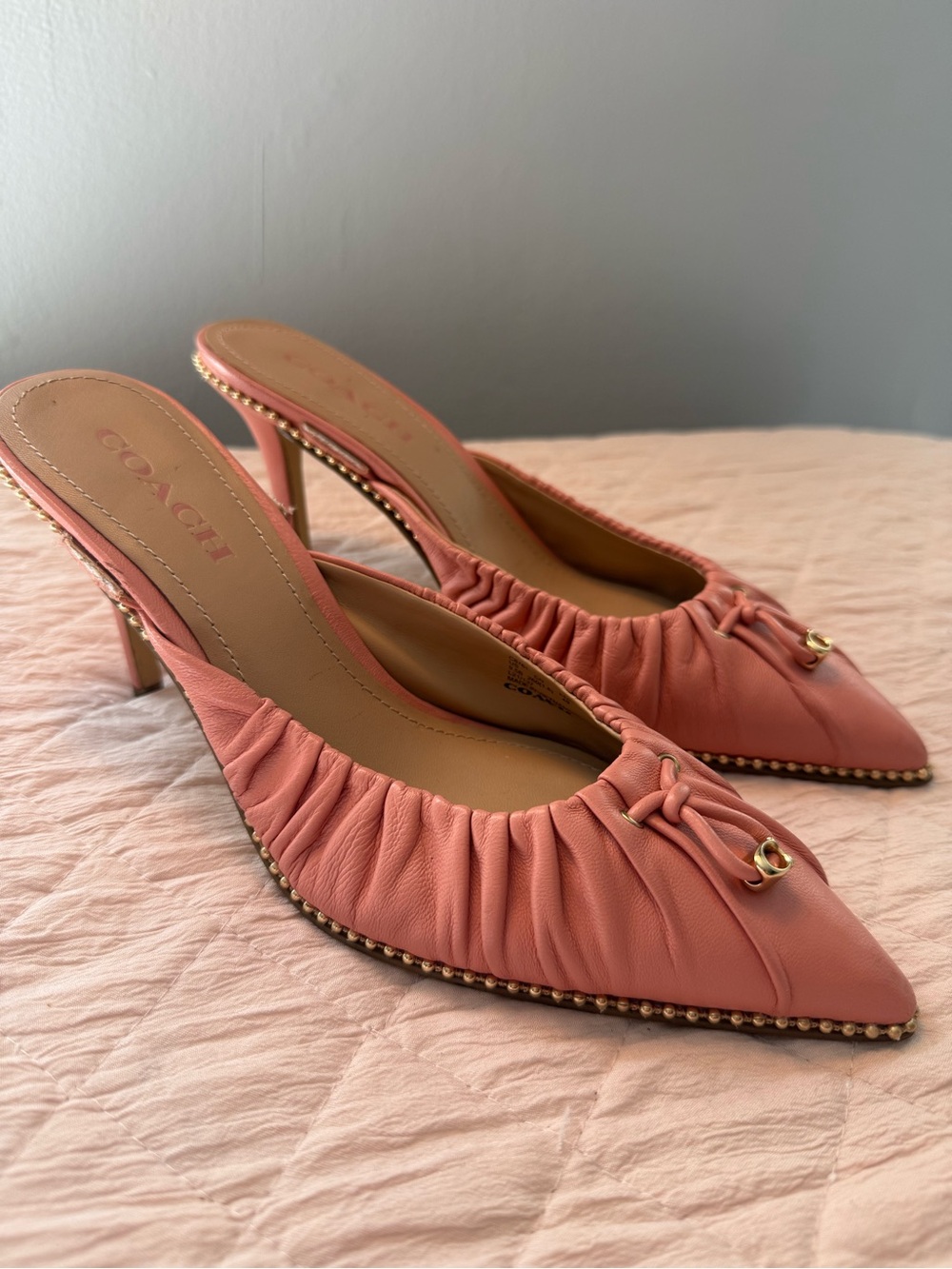 Coach Coral Pink Ruched Leather Pointed Mules with Gold Accent